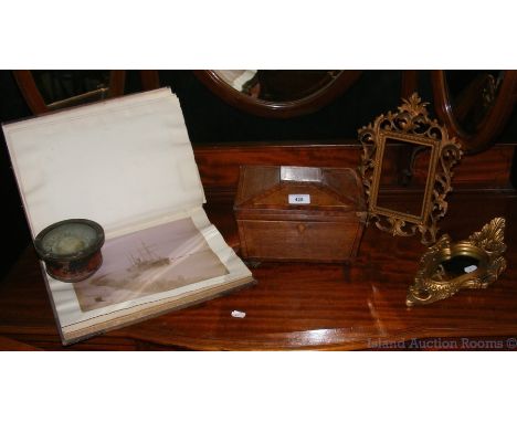 Old tea caddy, album containing interesting early photographs