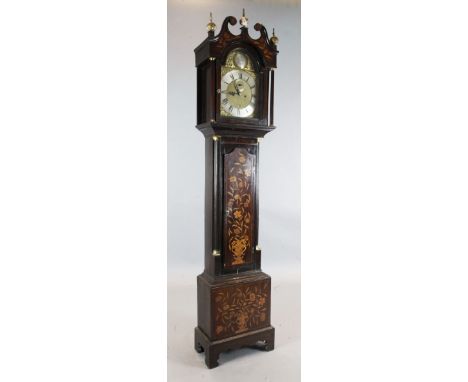 Thos. Chapman of Bath. A George III marquetry inlaid mahogany eight day longcase clock, the 12 inch arched brass dial with su