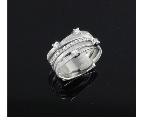 An Italian Marco Bicego 18ct white gold and diamond set multi band dress ring, size K.