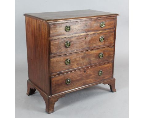 A George III mahogany chest, of four graduated long drawers, on swept bracket feet, W.2ft 10in. D.1ft 8in. H.2ft 11in.