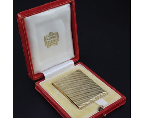 A 1960's Cartier engine turned ribbed 9ct gold matchbook case, hallmarks for Jacques Cartier, London, 1960, numbered L1712, 3