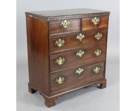 A George III mahogany chest, of two short and three graduated long drawers, on bracket feet, W.2ft 7in. D.1ft 5in. H.2ft 11in