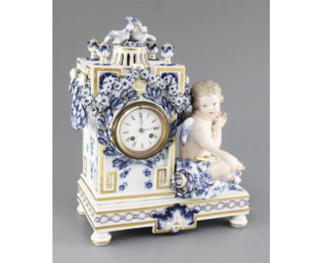 A Meissen figural mantel clock, late 19th century, of architectural form with the seated figure of Cupid to one side, painted