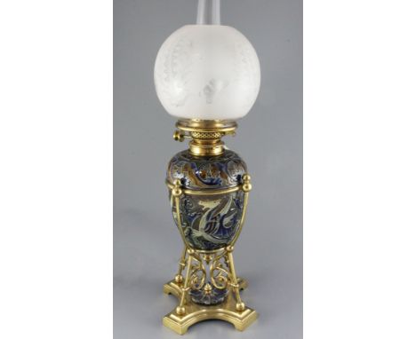 Mark V. Marshall for Doulton Lambeth- a stoneware oil lamp c. 1882, relief decorated with stylised winged horses and cats ami