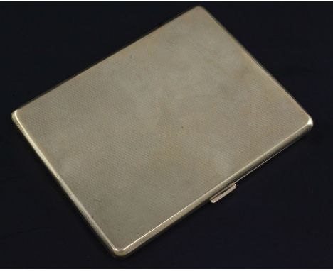 A late 1920's engine turned 9ct gold cigarette case, of rectangular form, with interior engraved inscription, Adie Bros. Birm