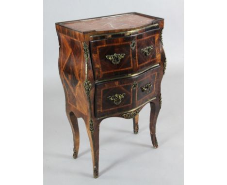 A 19th century French kingwood and rosewood bombé commode, with rouge marble top and two drawers, W.1ft 9in. D.1ft 1in. H.2ft