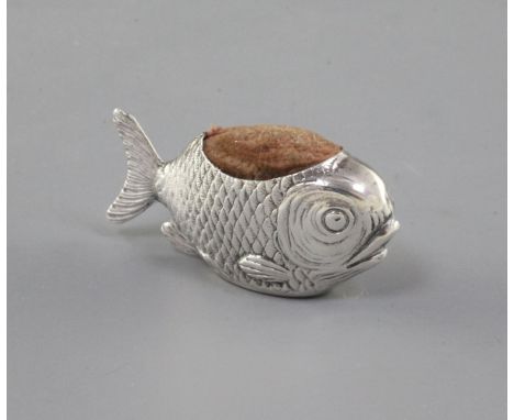 An Edwardian novelty silver pin cushion modelled as a fish by Sampson Mordan & Co, Chester, 1908, 1.5in.