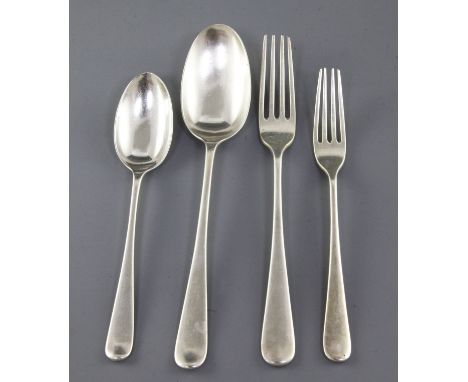 An Edwardian part canteen of silver Hanovarian rat tail flatware by Elkington & Co, comprising twelve table spoons, twelve ta