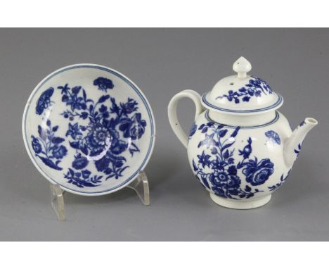 A Worcester miniature 'Three Flowers' pattern globular teapot and cover, c.1780, shaded crescent mark, height 9.5cm, together