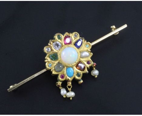 An Indian gold, enamel and multi gem set bar brooch, including white opal, garnet and sapphire, (converted?), 2.25in.