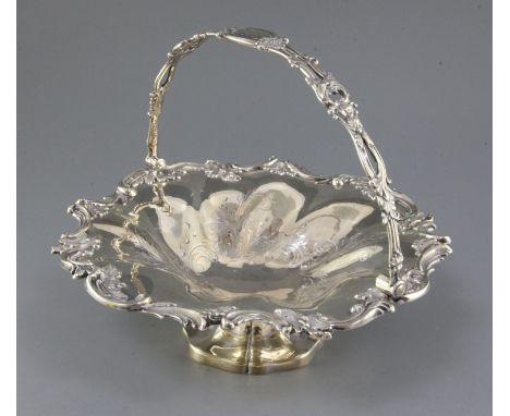 An early Victorian silver fruit basket, with foliate scroll border and similar engraved decoration, Henry Wilkinson, Sheffiel