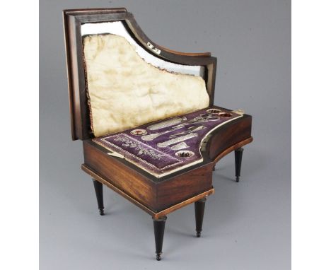 A 19th century French mahogany novelty etui, modelled as a square piano, the internal tray with silver, steel and mother of p