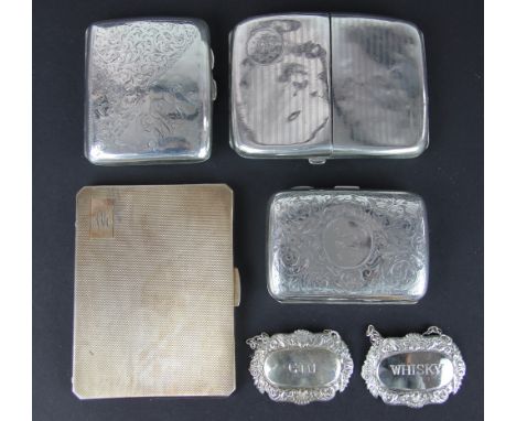 Four silver cigarette cases, to include: a silver gilt example Clark and Sewell, Chester 1945, another John Rose Birmingham 1