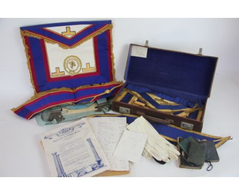 A collection of Warwickshire Masonic items, to include seven pouches, a pair of cuffs, a sash, various books etc