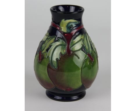 A Moorcroft Apples pattern vase, c. 1996, the tapering ovoid  vase decorated with apples and foliage  against a cobalt ground