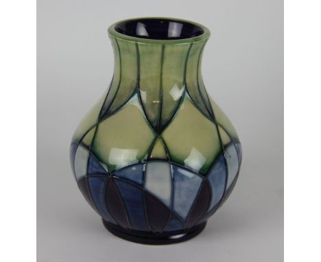 A Moorcroft Indigo pattern vase c. 1999, decorated with geometric patterns in cobalt, purple, indigo and green, impressed mar