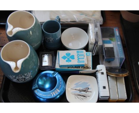 A collection of British Overseas Airways Corporation (BOAC) memorabilia, including booklets, flight accessories, soap, cerami