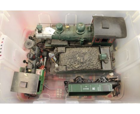 A Bachmann ET & WNC Railroad loco and tender; a Lehmann LGB loco and tender; three open trucks; two wagons; a Rigi Duo Cablew