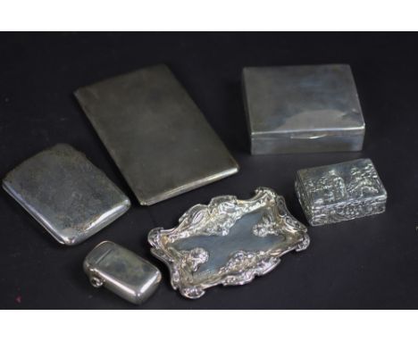 A collection of silver wares, to include: an Art Nouveau pin dish, London, 1902, 11cm, an engine turned rectangular cigarette