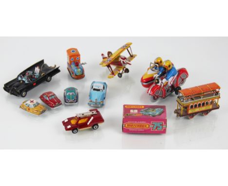 Two Chinese tin plate clock work toys, motorcycle & sidecar and train; a German ZZ toys airplane and saloon car; a tram; a Ma