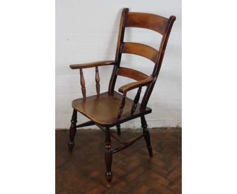 A 19th Century beech and ash kitchen chair, with ladder back and solid seat, on turned legs