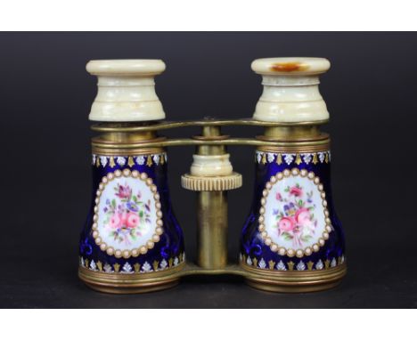 A pair of late 19th Century French enamel, ivory and lacquered brass opera glasses, the barrels painted with four floral pane