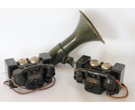 Two military issue field telephones, Set F, MK II, each with twin bells, with a PYE megaphone