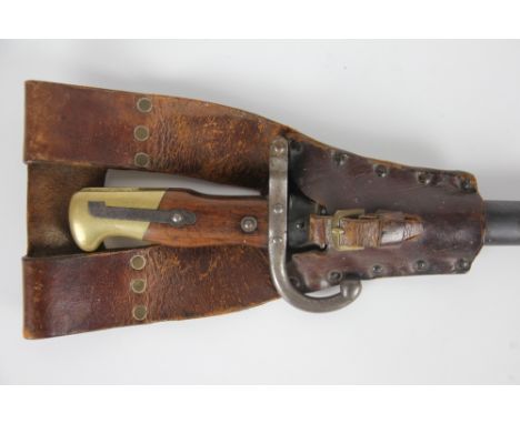 A late 19th Century French Gras bayonet, 52cm St Etienne blade dated 1879, in original scabbard with leather belt strap 