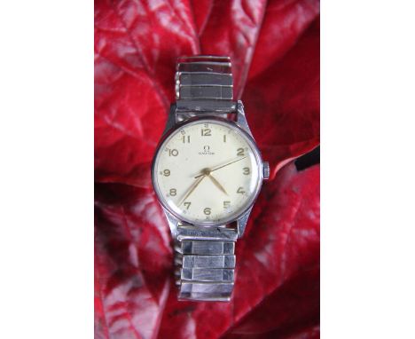 A gentleman's Omega wristwatch, the stainless steel case with circular face, champagne coloured dial, centre sweep seconds, g