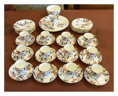19th Century William Brownfield twelve person tea service having polychrome stylised foliate decoration   Condition: 