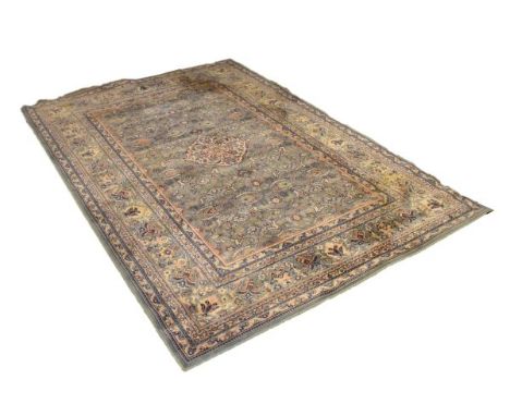 Modern Middle Eastern style carpet having foliate decoration on a pale green ground within multi borders, 291cm x 200cm   Con