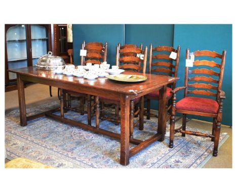 Good quality reproduction oak seven piece dining suite by Brights of Nettlebed comprising: rectangular top refectory dining t