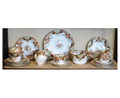 Early 20th Century bone china tea service having chinoiserie style floral decoration   Condition: 