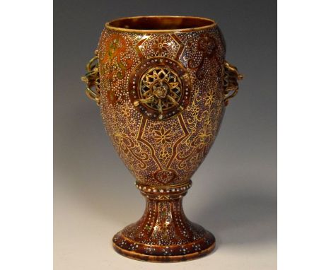 Fischer majolica lamp base having gilt highlighted white speckled decoration on a mottled red ground and with four relief res