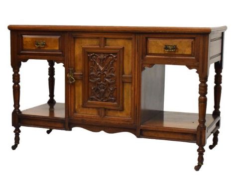 Late Victorian carved walnut side table with moulded rectangular top over short drawers flanking panelled and carved central 