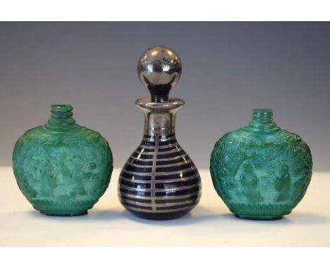 Early 20th Century silver overlaid amethyst glass scent bottle, together with two malachite glass scent bottles   Condition: 