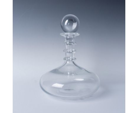 Stunning clear crystal decanter, elegantly crafted in a bulbous shape with three finely detailed rings for enhanced grip whil