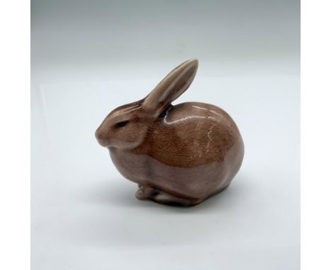 Glossy brown ceramic rabbit with Rookwood backstamp on the bottom. Issued: Early 20th c. Dimensions: Approximately 3.5"L x 2"