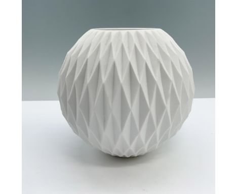 A white round ceramic vase with an elegantly engraved diamond design. Thomas backstamp. Marked Germany. Dimensions: 5.5"H x 5