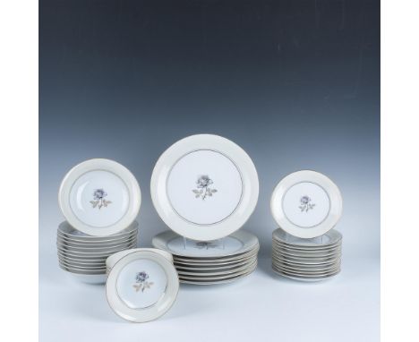 An exquisite set of 42 pieces showcasing a cream colored outer ring and white center with elegant white roses adorned with pi