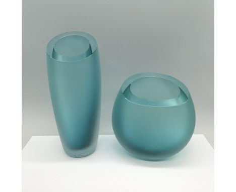 A pair of fogged teal crystal vases, both circular, one round and the other long and slender with a round cut mouth. Nouvel m