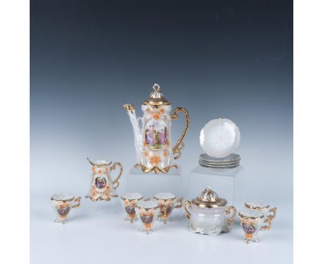 Porcelain tea service with gold detailing depicting antique bacchanal scenes. All pieces have an iridescent hue. Service incl