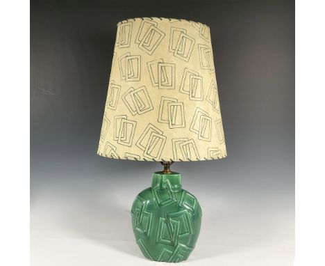 Green glazed ceramic lamp base with raised relief linked rectangle decoration. Base 8.25"L x 4.75"W x 13.5 to socket, 24"H to