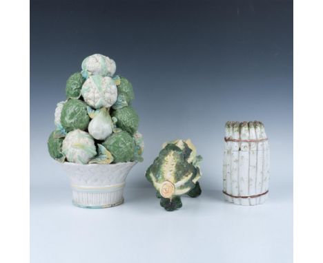 A set of 3 ceramic items include a head of romaine lettuce standing on its leaves with a removeable lid, an asparagus bunch w