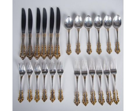 Beautiful silver set for 6 people, decorated with gold ornament in the Golden Medici pattern. Includes per seat: One soup spo