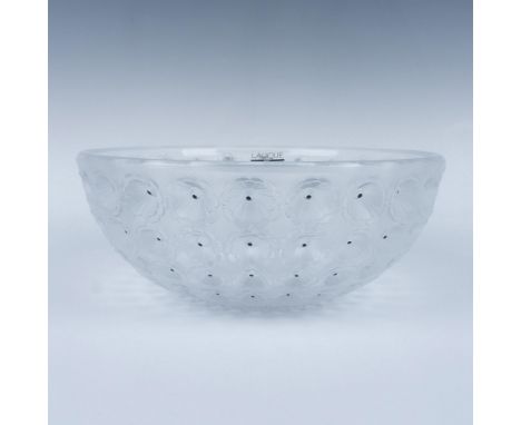 A round frosted and clear bowl. Beautifully decorated with floral sunken relief pattern, each flower with a painted black cen