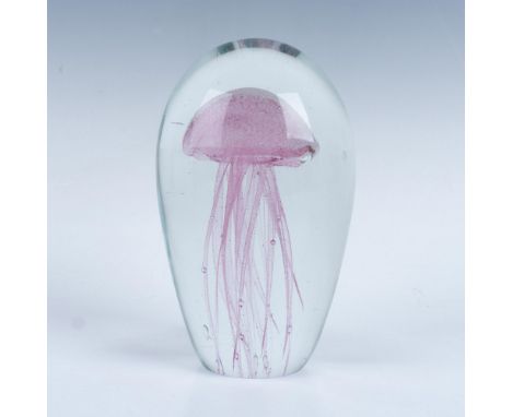 Exquisite pink jellyfish beautifully encapsulated within clear crystal, creating a mesmerizing display. Fluoresces brilliantl
