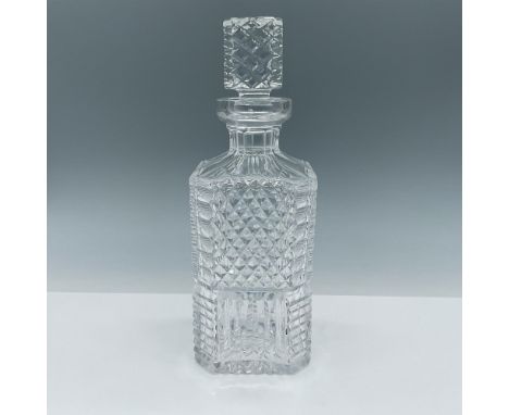 Gorgeous diamond patterned square decanter with matching lid. Waterford acid etched backstamp on base. Dimensions: 3.75"L x 3