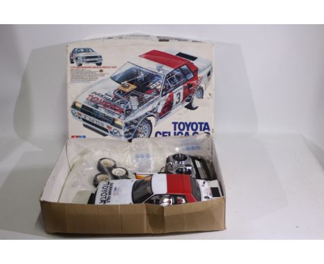 Tamiya - A boxed and constructed vintage Tamiya #58064 1:12 scale electric RC Toyota Celica Gr.B Rally Special. The kit has b