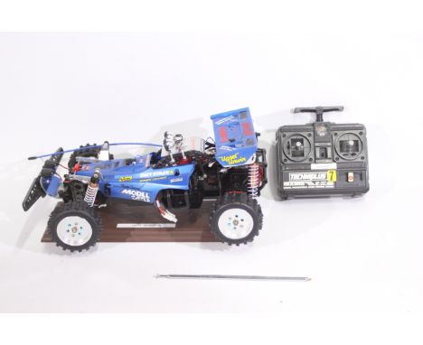 Tamiya - An unboxed Tamiya 1:10 electric RC 'HotShot II' High Performance 4WD Off Road Racer. The model exhibits some very li